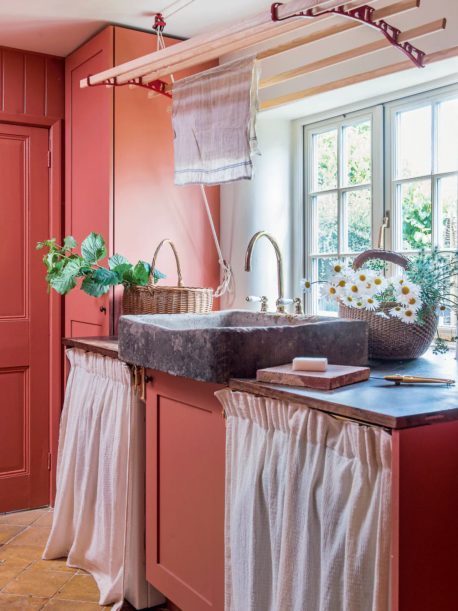 Country style kitchen with stone sink